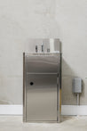 An image of a stainless steel self-contained handwash basin with splashback.